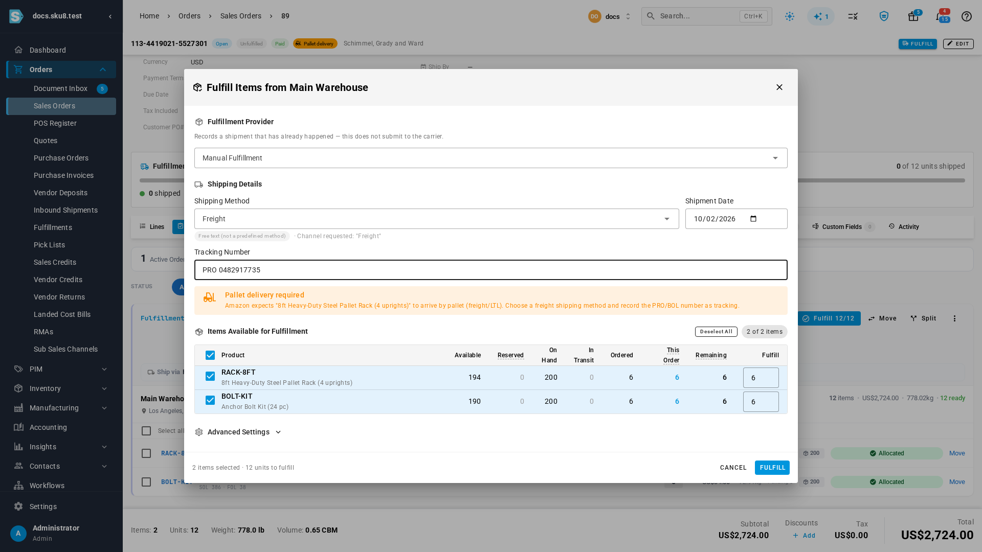 The Fulfill Items dialog with a "Pallet delivery required" warning naming the 8ft pallet rack, a Freight shipping method and a PRO number entered as tracking