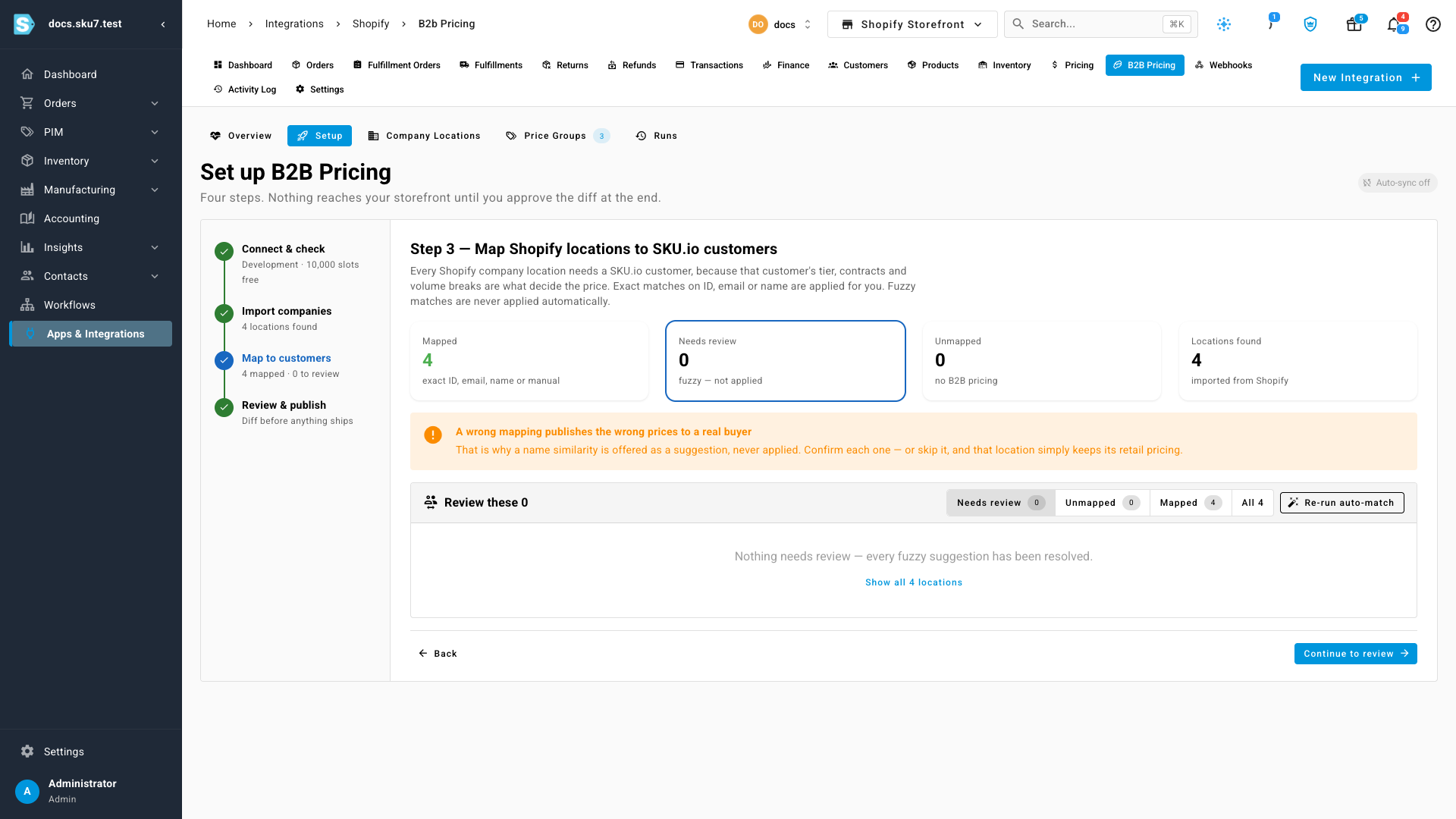 The mapping step, showing four Shopify company locations matched to SKU.io customers