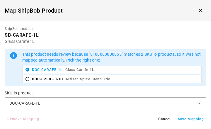 The Map ShipBob Product dialog listing the two SKU.io products that share the barcode, with DOC-CARAFE-1L picked