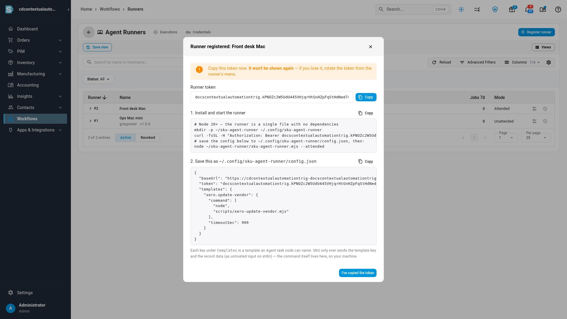 The runner's token, the install commands, and the config file