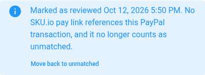 The note on a reviewed transaction: Marked as reviewed, with the date, and a Move back to unmatched link