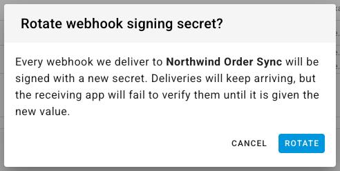The Rotate webhook signing secret confirmation dialog with Cancel and Rotate buttons