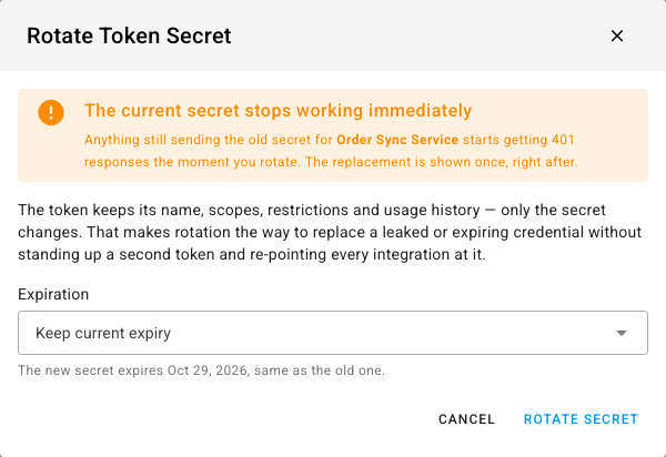 The Rotate Token Secret dialog warning that the current secret stops working immediately