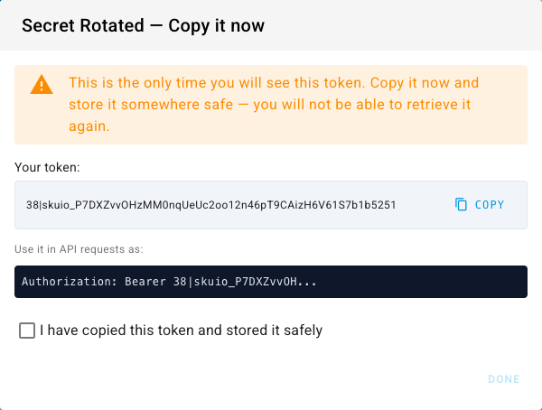 The Secret Rotated dialog showing the replacement token value and a Copy button