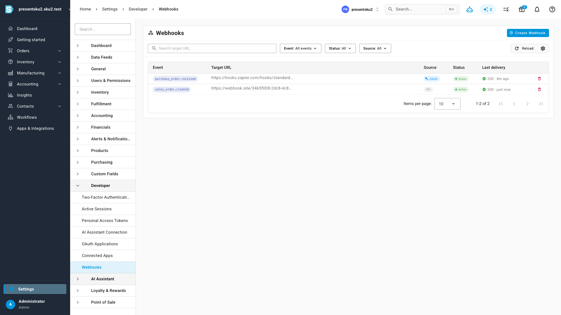 The Webhooks page listing subscriptions with event, target URL, source, status, and last delivery
